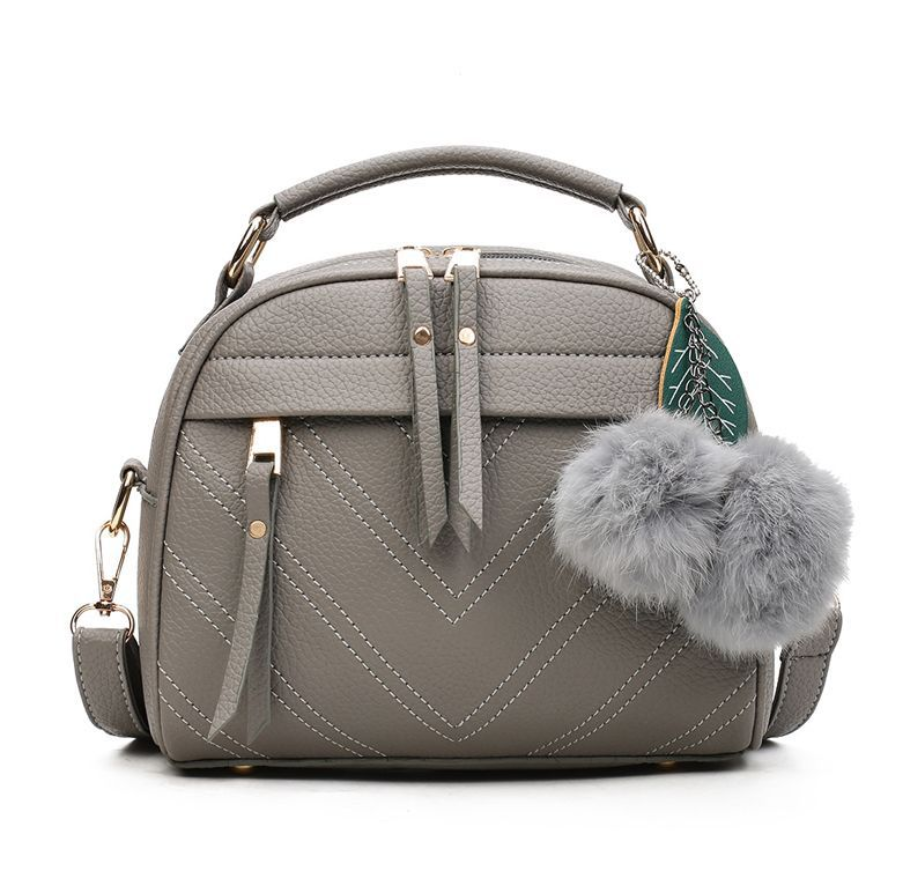 Opulent Tale of Hair Ball and Shoulder Bag GlamzLife